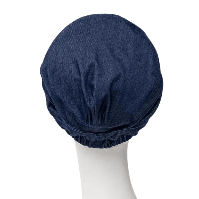 Tummansinisen Christine Headwear Yoga turbaanin takaosa farkkukankaasta mallinukella, rypytetyllä reunalla